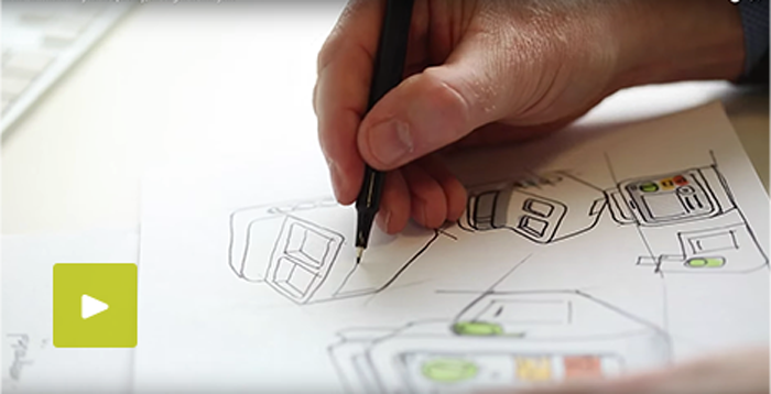 uma m&atilde;o que segura uma caneta