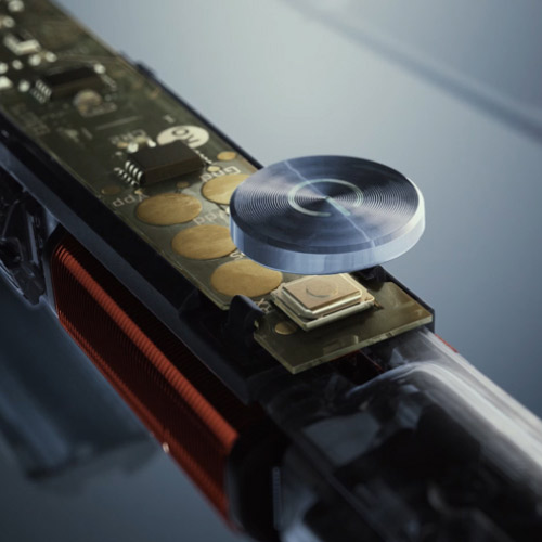 Um close-up do interior de uma m&aacute;quina em funcionamento.